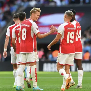 Arsenal FC Print: Trossard and Odegaard Celebrate Goal