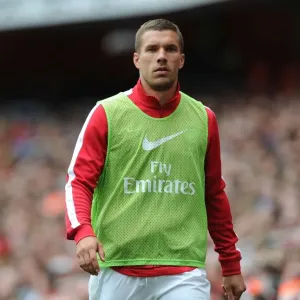Arsenal's Lukas Podolski in Action: Arsenal vs. Aston Villa (2013-14 Premier League)
