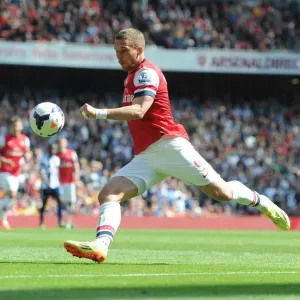 Arsenal's Lukas Podolski in Action Against West Bromwich Albion (2013-14) Arsenal's Lukas Podolski in Action Against West Bromwich Albion (2013-14)