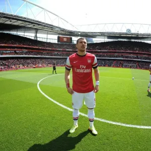 Arsenal's Lukas Podolski Readies for Arsenal vs. West Bromwich Albion (2013-14) Arsenal's Lukas Podolski Readies for Arsenal vs. West Bromwich Albion (2013-14)