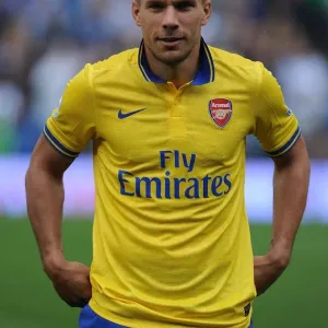 Arsenal's Lukas Podolski Readies for Fulham Clash in 2013-14 Premier League Arsenal's Lukas Podolski Readies for Fulham Clash in 2013-14 Premier League