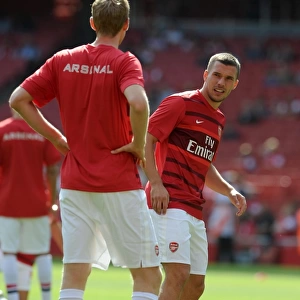 Arsenal's Lukas Podolski Scores in 6-1 Victory over Southampton in Barclays Premier League