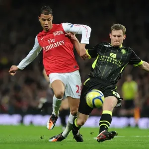 Arsenal's Marouane Chamakh Breaks Past Leeds Tom Lees in FA Cup Clash