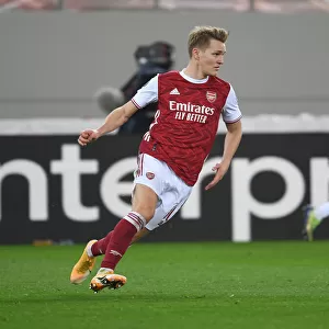 Arsenal's Martin Odegaard in Action against SL Benfica in UEFA Europa League Round of 32, Piraeus, Greece (February 2021)