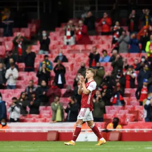 Arsenal's Martin Odegaard Applauding Fans: Arsenal v Brighton & Hove Albion, Premier League 2020-21 Arsenal's Martin Odegaard Applauding Fans: Arsenal v Brighton & Hove Albion, Premier League 2020-21