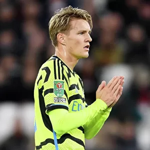 Arsenal's Martin Odegaard Applauding Fans after Carabao Cup Victory over West Ham United