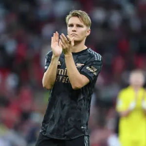 Arsenal's Martin Odegaard Applauding Fans after Manchester United Clash - Premier League 2022-23 Arsenal's Martin Odegaard Applauding Fans after Manchester United Clash - Premier League 2022-23