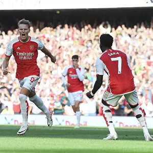 Arsenal's Martin Odegaard and Bukayo Saka Celebrate First Goal Against Manchester United (2023-24)