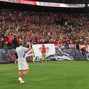 Arsenal's Martin Odegaard Celebrates with Fans after Pre-Season Victory over Everton