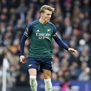 Arsenal's Martin Odegaard Charges Forward in Premier League Clash Against Fulham (2023-24)