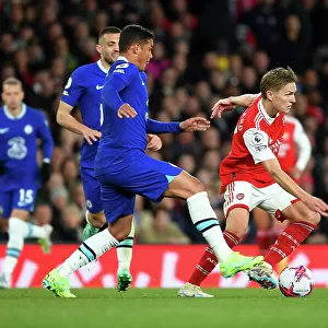 Arsenal's Martin Odegaard Faces Off Against Chelsea's Thiago Silva in Intense Premier League Clash