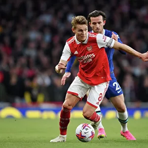 Arsenal's Martin Odegaard Faces Off Against Chelsea's Ben Chilwell in Intense Premier League Clash