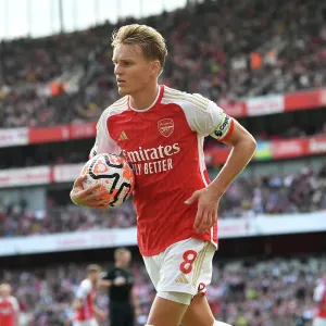 Arsenal's Martin Odegaard Faces Off Against Tottenham in the 2023-24 Premier League Clash at Emirates Stadium Arsenal's Martin Odegaard Faces Off Against Tottenham in the 2023-24 Premier League Clash at Emirates Stadium