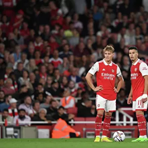Arsenal's Martin Odegaard and Gabriel Martinelli in Action against Aston Villa, 2022-23 Premier League