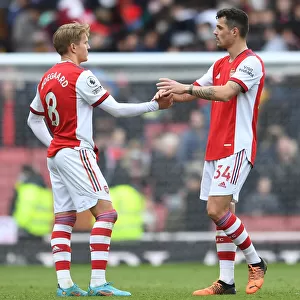 Arsenal's Martin Odegaard and Granit Xhaka Celebrate Victory Over Brighton & Hove Albion in Premier League