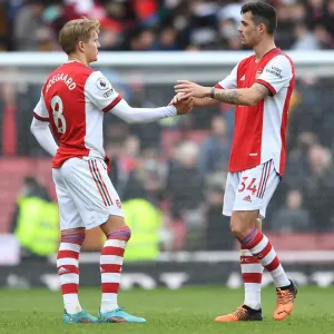 Arsenal's Martin Odegaard and Granit Xhaka Celebrate Victory Over Brighton & Hove Albion in Premier League