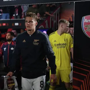 Arsenal's Martin Odegaard Leads Team Out Against PSV Eindhoven in Europa League