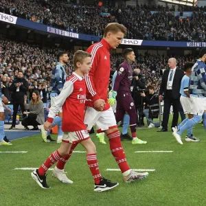 Arsenal's Martin Odegaard and Mascot Before Manchester City Clash - Premier League 2022-23 Arsenal's Martin Odegaard and Mascot Before Manchester City Clash - Premier League 2022-23