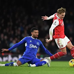 Arsenal's Martin Odegaard Outsmarts Everton's Ben Godfrey: A Premier League Battle at Emirates Stadium