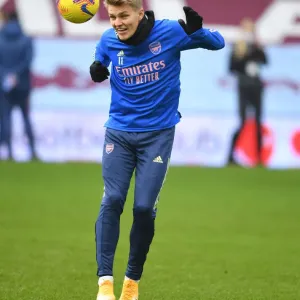 Arsenal's Martin Odegaard Prepares for Aston Villa Clash in Empty Villa Park (Aston Villa vs Arsenal, 2021-22 Premier League)