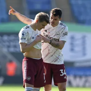 Arsenal's Martin Odegaard Receives Instructions from Granit Xhaka During Leicester City Match, Premier League 2020-21 Arsenal's Martin Odegaard Receives Instructions from Granit Xhaka During Leicester City Match, Premier League 2020-21