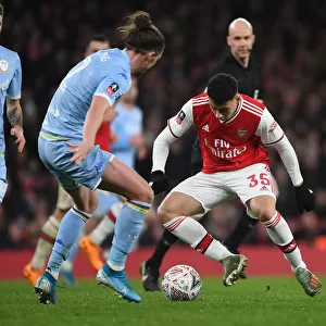 Arsenal's Martinelli Clashes with Leeds Ayling in FA Cup Showdown