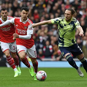 Arsenal's Martinelli Clashes with Leeds Ayling in Premier League Showdown