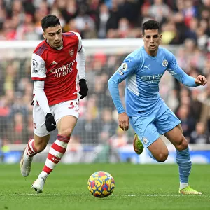 Arsenal's Martinelli Clashes with Manchester City's Cancelo in Premier League Showdown