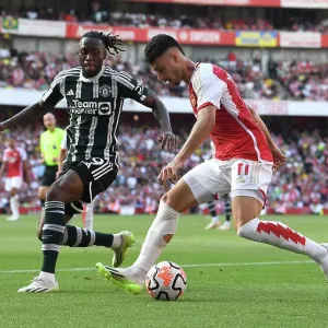 Arsenal's Martinelli Clashes with Manchester United's Wan-Bissaka in 2023-24 Premier League Showdown