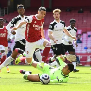 Arsenal's Martinelli Faces Off Against Fulham's Areola in Empty Emirates Stadium