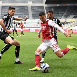 Arsenal's Martinelli Faces Off Against Newcastle's Fernandez in Empty St. James Park
