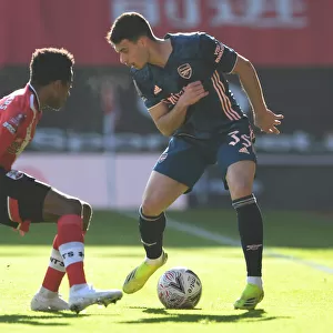 Arsenal's Martinelli Faces Southampton's Walker-Peters in FA Cup Clash Amid Empty Stands