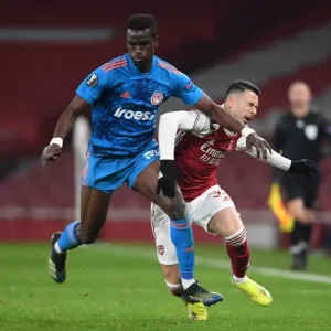 Arsenal's Martinelli Fouls Olympiacos Ba in Empty Europa League Clash (2020-21) Arsenal's Martinelli Fouls Olympiacos Ba in Empty Europa League Clash (2020-21)