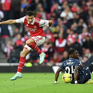 Arsenal's Martinelli Leaps Past Forest's Aurier in Premier League Clash