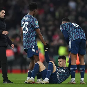 Arsenal's Martinelli Receives Attention from Mikel Arteta after Injury in Carabao Cup Semi-Final vs. Liverpool