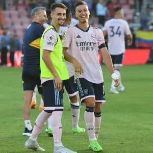 Arsenal's Martinelli and Vieira Celebrate Victory over AFC Bournemouth in 2022-23 Premier League Arsenal's Martinelli and Vieira Celebrate Victory over AFC Bournemouth in 2022-23 Premier League