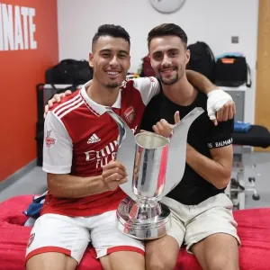 Arsenal's Martinelli and Vieira Lift Emirates Cup after Arsenal vs Sevilla Friendly Arsenal's Martinelli and Vieira Lift Emirates Cup after Arsenal vs Sevilla Friendly