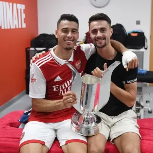 Arsenal's Martinelli and Vieira Lift Emirates Cup Print