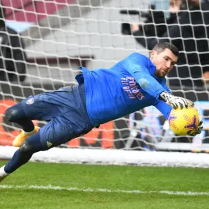 Arsenal's Mat Ryan in Action at Empty Villa Park: Premier League 2021