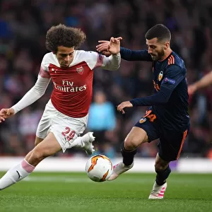 Arsenal's Matteo Guendouzi Outmaneuvers Valencia's Jose Gaya in UEFA Europa League Semi-Final Clash