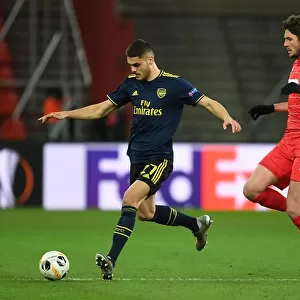 Arsenal's Mavropanos Faces Off Against Standard Liege's Avenatti in Europa League Clash