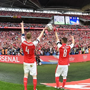 Arsenal's Per Mertesacker and Aaron Ramsey Celebrate FA Cup Victory
