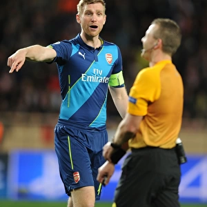 Arsenal's Per Mertesacker Confers with Referee during Monaco Showdown in 2015 Champions League