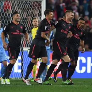 Arsenal's Per Mertesacker, Sead Kolasinac, Krystian Bielik, and Francis Coquelin Celebrate Goal in Sydney FC Friendly Arsenal's Per Mertesacker, Sead Kolasinac, Krystian Bielik, and Francis Coquelin Celebrate Goal in Sydney FC Friendly