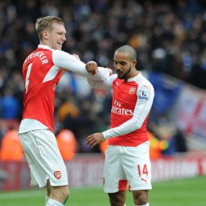 Arsenal's Per Mertesacker and Theo Walcott Celebrate Victory over Leicester City, 2016