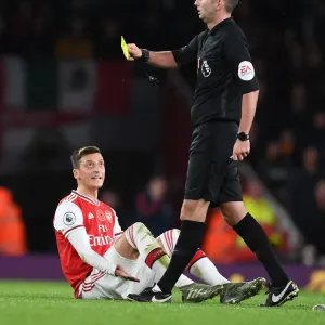 Arsenal's Mesut Ozil Argues with Referee during Arsenal v Wolverhampton Wanderers Premier League Match Arsenal's Mesut Ozil Argues with Referee during Arsenal v Wolverhampton Wanderers Premier League Match