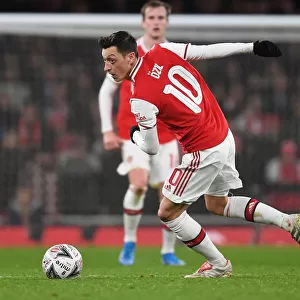 Arsenal's Mesut Ozil in FA Cup Action Against Leeds United