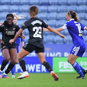Arsenal's Michelle Agyemang Faces Pressure from Leicester City's Molly Pike in Women's Super League Clash