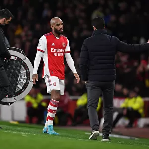 Arsenal's Mikel Arteta and Alex Lacazette: A Tactical Duo in Arsenal vs. Liverpool (2021-22)