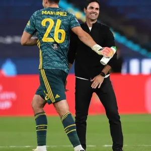 Arsenal's Mikel Arteta Celebrates FA Cup Semi-Final Victory with Emi Martinez